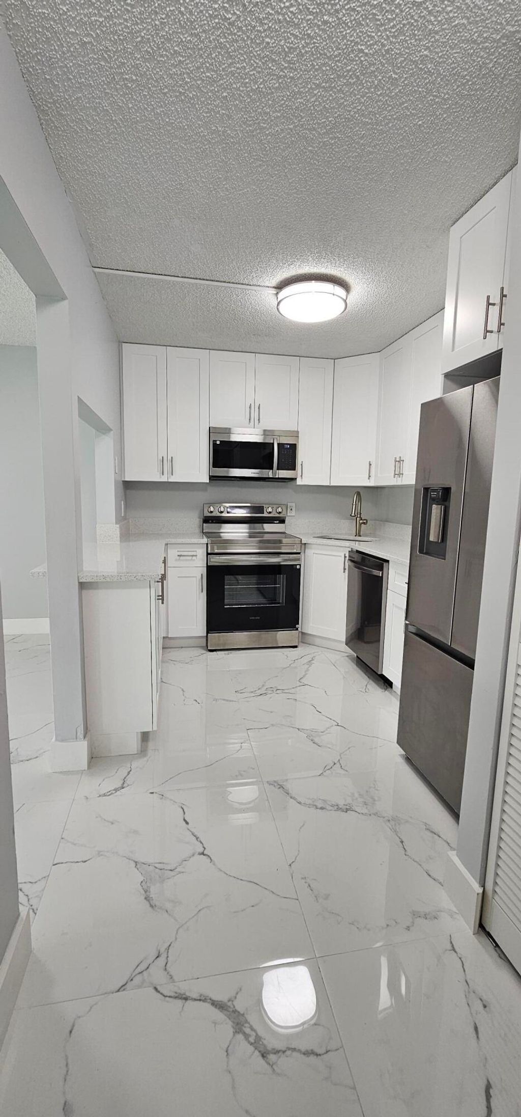 Photo of 4991 Sable Pine Circle #B1, West Palm Beach, FL 33417 (MLS # B26030906)
