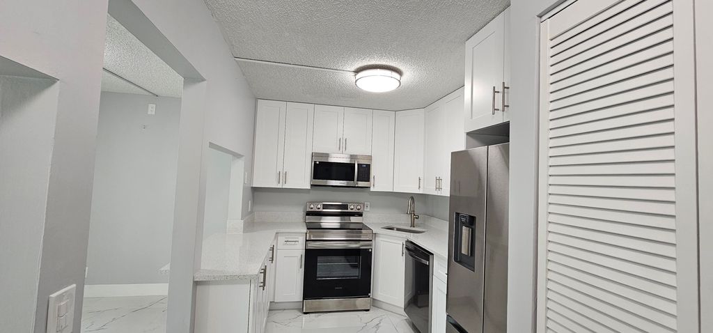 Photo of 4991 Sable Pine Circle #B1, West Palm Beach, FL 33417 (MLS # B26030906)