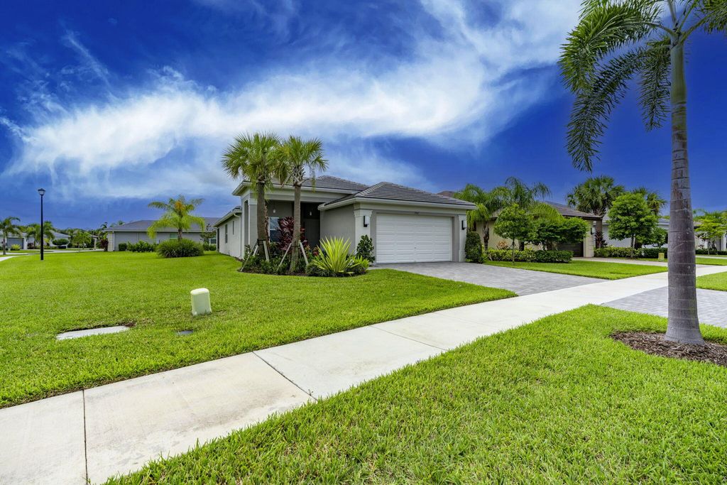 Photo of 13312 SW River Rock Road, Port Saint Lucie, FL 34987 (MLS # R11122416)