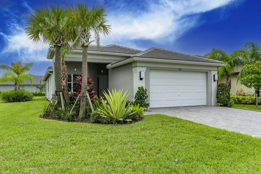 Photo of 13312 SW River Rock Road, Port Saint Lucie, FL 34987 (MLS # R11122416)