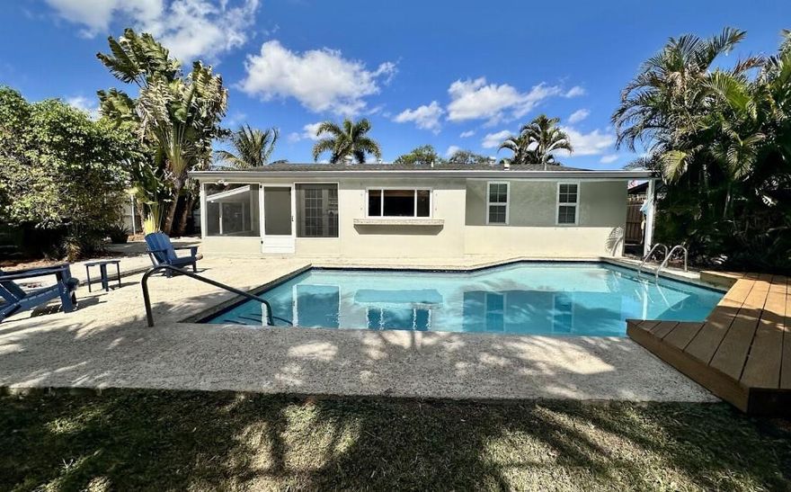 Welcome to this beautifully maintained concrete block pool home, offering the perfect blend of comfort, convenience, and Florida charm. Nestled in a quiet neighborhood with no HOA fees, this property is a true tropical oasis featuring lush, irrigated landscaping and a private, fully fenced yard—ideal for relaxing or entertaining.Step inside to a bright and airy interior with fresh paint inside and out, crown moulding throughout, and tile flooring in every room. The updated bathrooms add a modern touch, while the home’s well-maintained condition reflects pride of ownership.Enjoy outdoor living year-round with a screened-in porch, newly stained deck, and a refinished pool (2026)—your own private retreat.