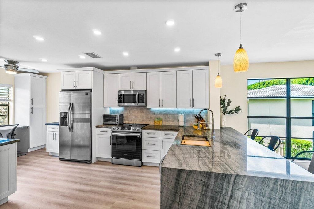 Photo of 5 Stratford Drive #B, Boynton Beach, FL 33436 (MLS # R11114535)