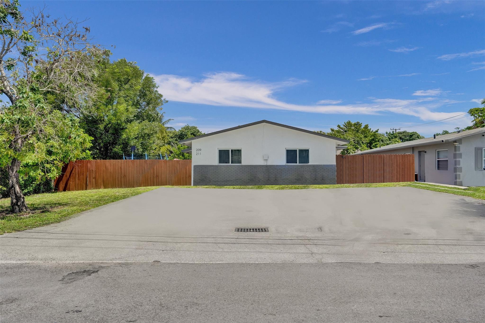 Seller will accept Crypto Currency! Don't hesitate, this is the best deal on a duplex in Broward County. Both units have recently remodeled interiors and hurricane Impact Windows. Each unit has their own private washer and dryer. Walking distance to booming Downtown Pompano Beach. Schedule a showing today!