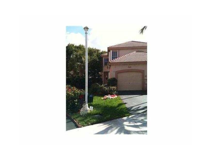 BEAUTIFUL CORNER TOWNHOUSE IN SAN REMO AT WESTON, TOTALLY RENOVATED,NEW CERAMIC FLOOR, GRANITE COUNTERTOPS AND TOP OF THE LINE STAINLESS STEEL APPLIANCES. BATHROOMS TOTALLY REMODELED. HURRICANE SHUTTERS, A+ DISTRICT SCHOOLS.