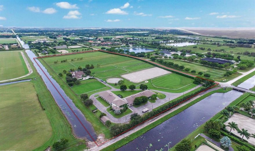 Location, Location !! Great Property on a 20 Acre parcel (4 plotted 5 acre lots) within hacking distance to WEF and all equestrian venues.  Finely equipped with a 20 Stall barn, 6 large Paddocks, tack rooms, wash stalls, storage areas, a fully irrigated and crowned sand arena and a  round pen.  3 grooms apartments and 1 Patrons office.  Main house has a beautiful living room with vaulted ceilings and amazing views , cozy fireplace and much more. A must see!!