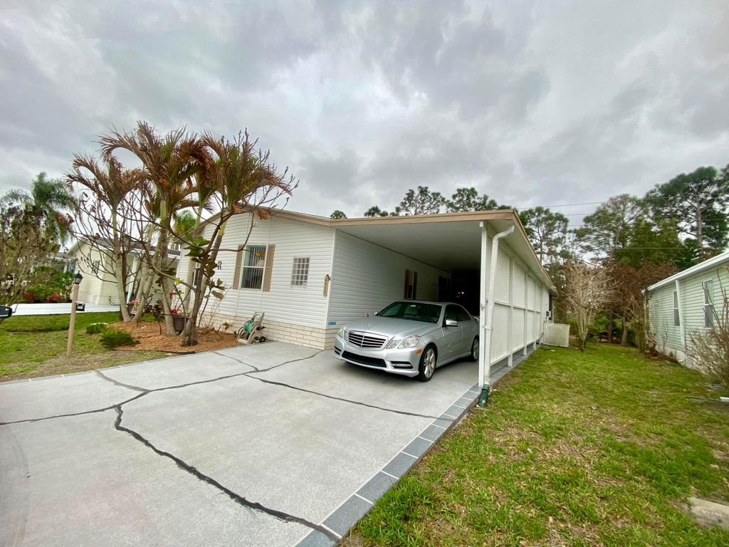 Photo of 4440 SE Sweetwood Way, Stuart, FL 34997 (MLS # B26004057)