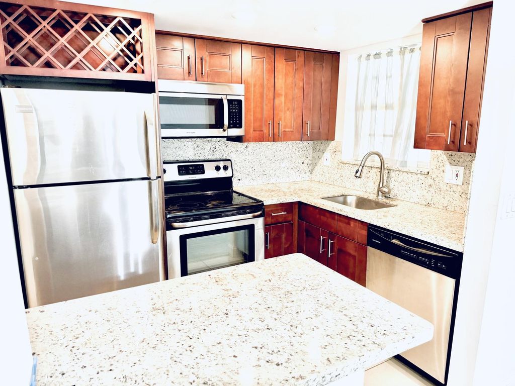 Photo of 1040 SE 4th Avenue #129, Deerfield Beach, FL 33441 (MLS # F10470312)