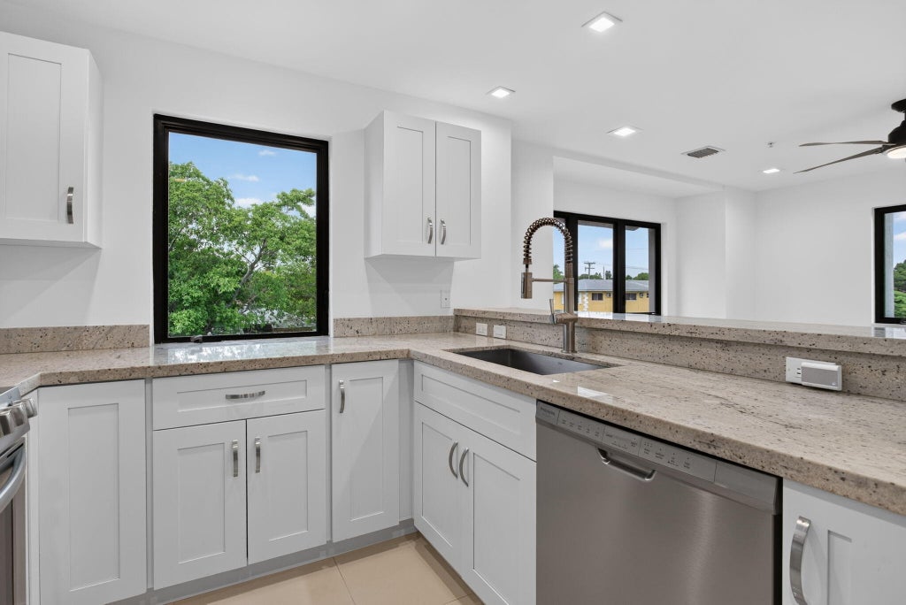 Photo of 444 NW 41ST Street, Oakland Park, FL 33309 (MLS # B26059824)
