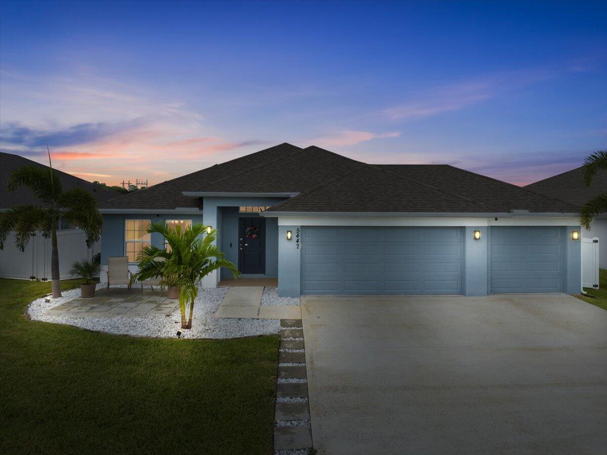 Welcome to Waterstone--a vibrant community where modern convenience meets serene waterfront living. This stunning 4-bedroom, 2-bathroom home with a massive 620sqft 3-car garage, built by Adams Homes in 2021, sits on a premium lot offering peaceful water views and thoughtful upgrades throughout. Step inside to an open floor plan adorned with LifeProof Dusk Cherry vinyl plank flooring and a gourmet kitchen featuring a peninsula-style granite countertop, ideal for casual dining or entertaining. The home's upgrades blend style and function--a hybrid heat-pump water heater (2022) for energy efficiency, solar panels by Windmar Solar financed through Sunnova, and a smart home system complete with Alexa-compatible switches, thermostat, and Blink outdoor cameras for peace of mind.