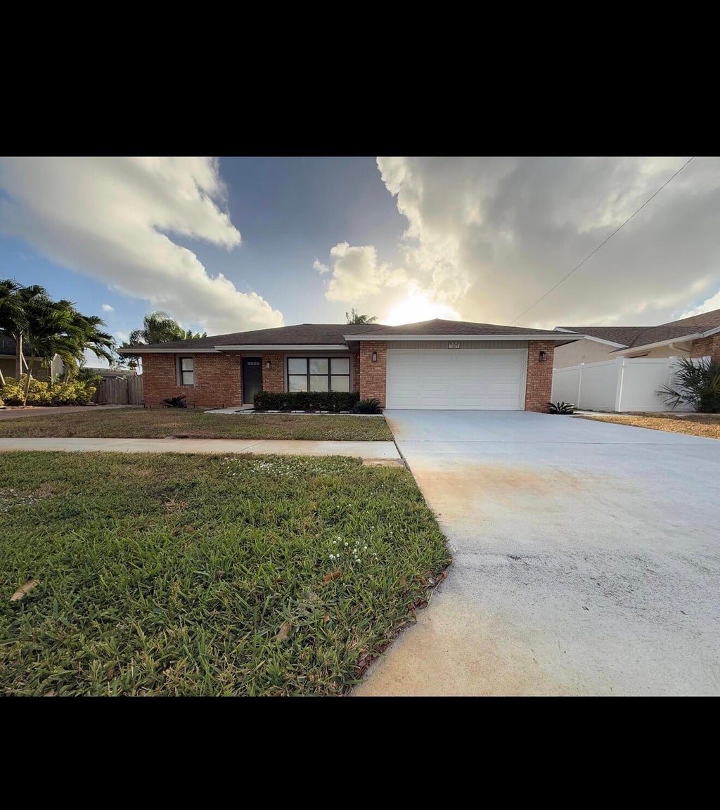 Photo of 1007 WYNNDALE Way, Lantana, FL 33462 (MLS # B26084408)