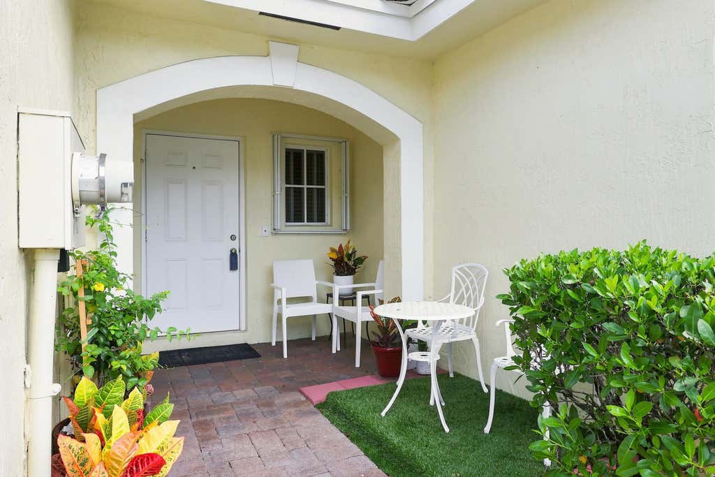 Photo of 1138 Imperial Lake Road, West Palm Beach, FL 33413 (MLS # B26056885)