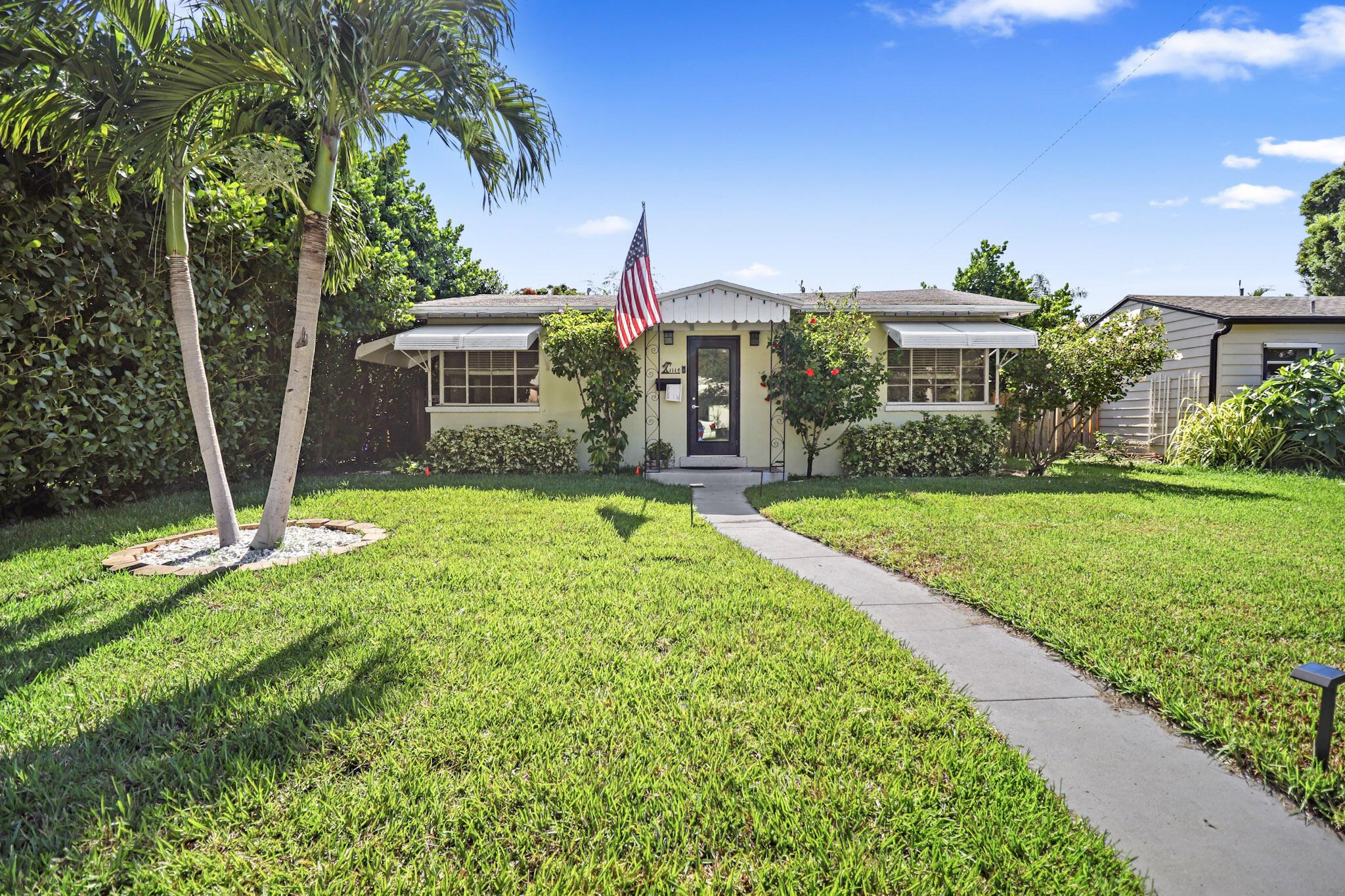 Amazing 2 Bedroom, 2 Bathroom home for rent in Lake Worth, Florida! Offering a renovated kitchen with newer appliances, updated bathrooms, and gorgeous terrazzo floors in the living areas, this stand-alone home also has a flex room perfect for an office or formal dining area and an oversized detached garage with washer and dryer. Enjoy all that Florida living has to offer on your large paved back patio and expansive fenced-in yard. Conveniently located close to I-95, beaches, and the popular Downtown Lake Worth. Call for a tour today!