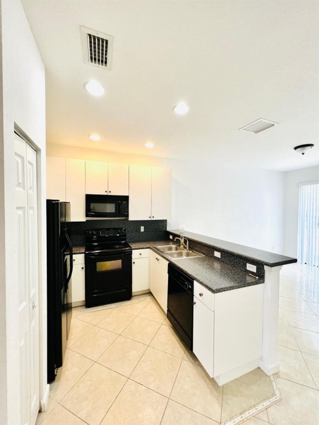 Photo of 1841 SW Via Rossa, Port Saint Lucie, FL 34953 (MLS # F10433351)