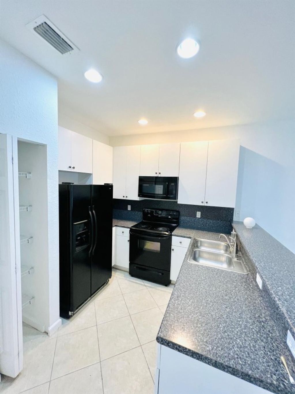 Photo of 1841 SW Via Rossa, Port Saint Lucie, FL 34953 (MLS # F10433351)