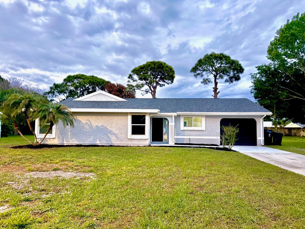 Photo of 1343 SE Vestridge Lane, Port Saint Lucie, FL 34952 (MLS # B26019029)