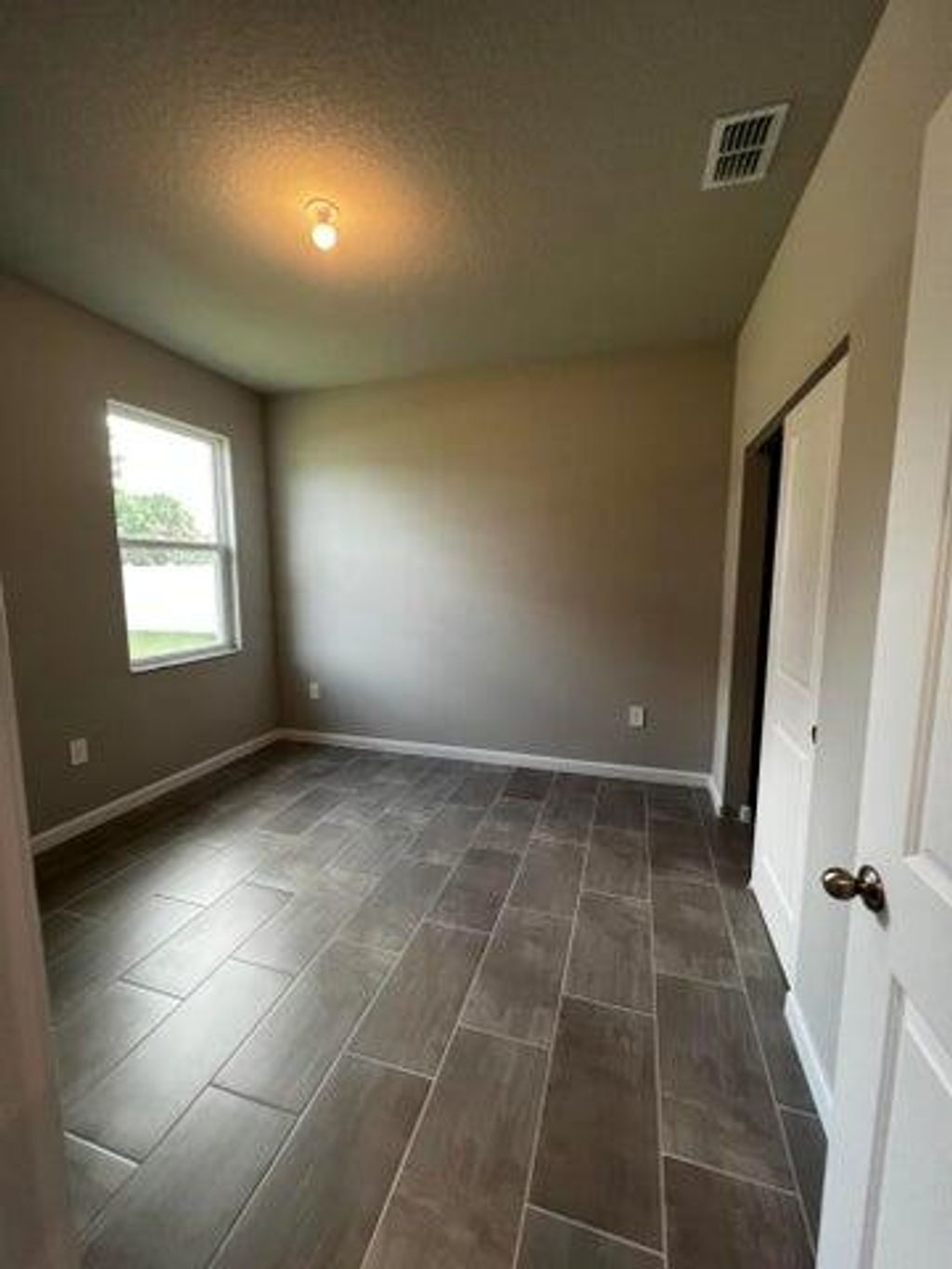 Photo of 2866 SW Rosetta Street, Port Saint Lucie, FL 34953 (MLS # R11017073)