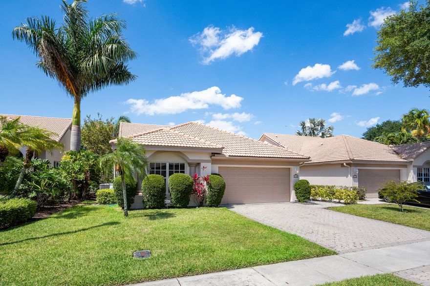 Welcome to effortless South Florida living in the prestigious Aberdeen Country Club. This beautifully updated 3-bedroom, 2-bath villa offers an open, spacious, and light-filled layout designed for both comfort and style.  Step inside to discover a desirable split-bedroom floor plan, providing privacy for both owners and guests. The home features brand-new flooring throughout, creating a seamless and modern feel. The renovated kitchen is a standout, thoughtfully redesigned with updated finishes and ample space for cooking and entertaining, flowing effortlessly into an oversized dining area—perfect for hosting gatherings.  The primary suite is a relaxing retreat, complete with dual sinks and a separate shower in the beautifully updated bathroom. Each space in this home has been carefully enhanced to offer both functionality and contemporary appeal.  Enjoy the lifestyle that Aberdeen Country Club is known for, with exceptional amenities, lush surroundings, and a vibrant community atmosphere. This move-in-ready villa is the perfect blend of elegance, comfort, and convenience.