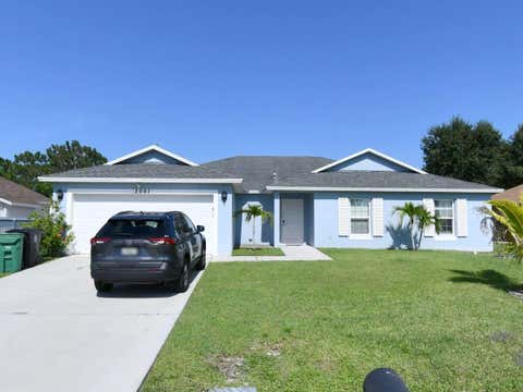 Photo of 3061 SW BRIGGS Street, Port Saint Lucie, FL 34953 (MLS # B26062953)