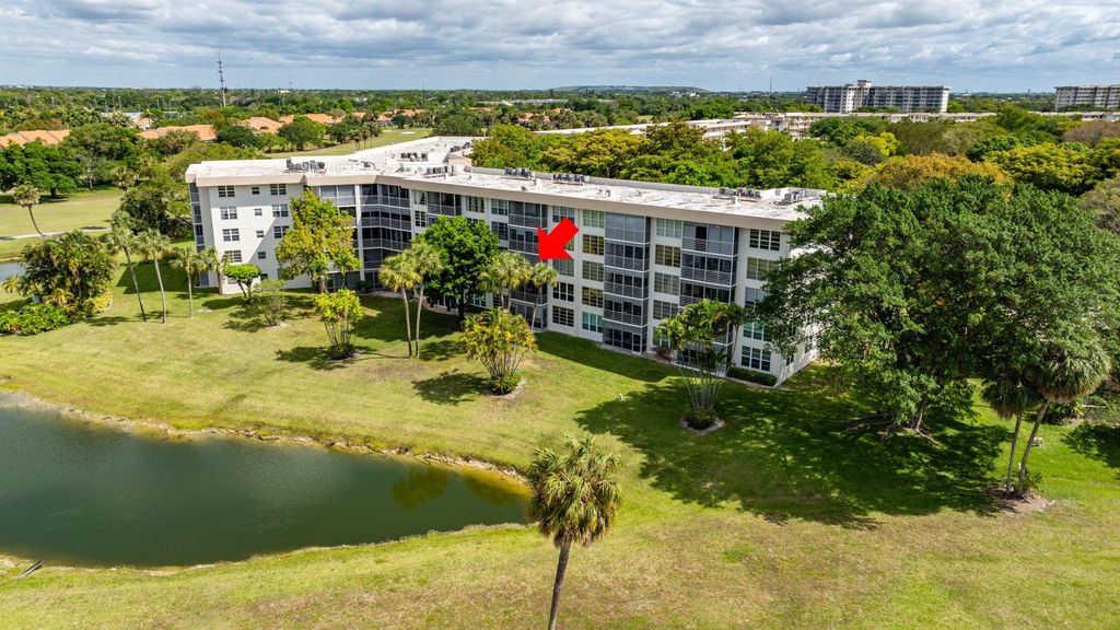Photo of 3980 Oaks Clubhouse Dr #310, Pompano Beach, FL 33069 (MLS # F10430662)