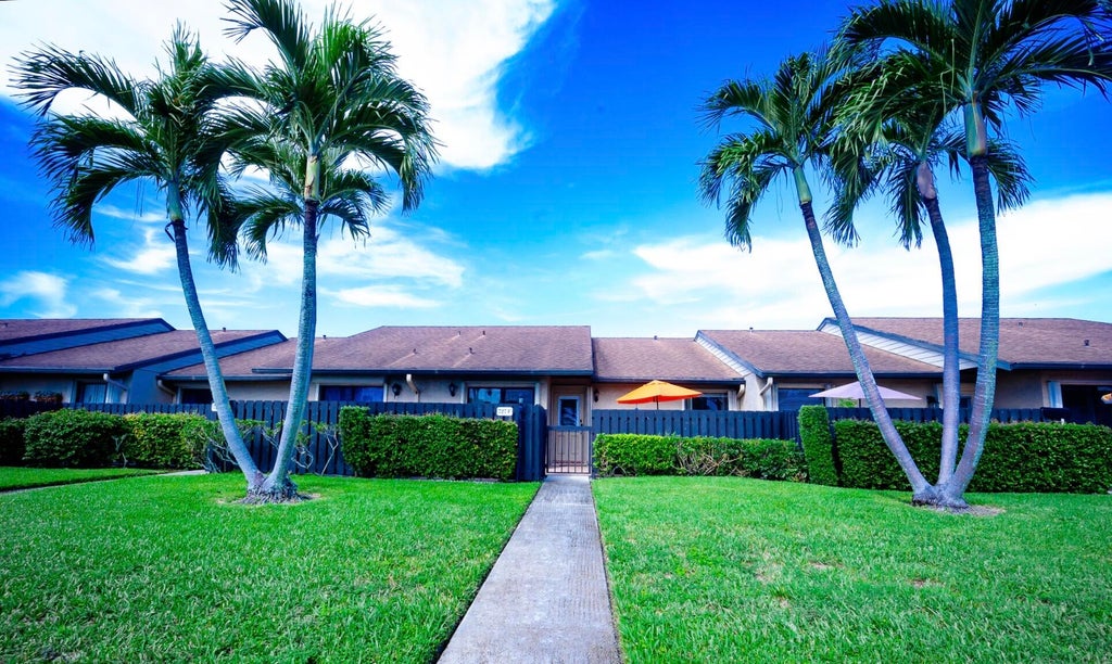 Photo of 727 Sunny Pine Way #F, Greenacres, FL 33415 (MLS # B26076731)