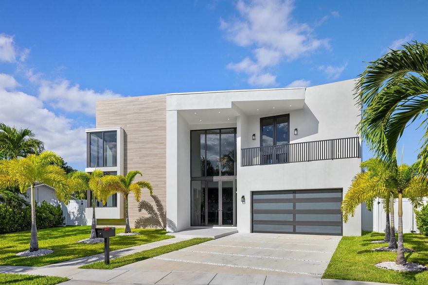 This new construction estate in prime East Boca Raton offers more than 5,000 sq. ft. of refined living space with modern architecture and resort-style amenities--an exceptional value for a move-in-ready residence in one of the area's fastest-appreciating communities. Designed for both everyday living and entertaining, the open-concept main level features double-height ceilings, custom cabinetry, and sophisticated finishes throughout. The home includes five bedrooms, six full bathrooms, one powder room, a private office, fully built-out closets, and a complete smart-home system with Sonos speakers, full camera coverage, and Wi-Fi access points.
