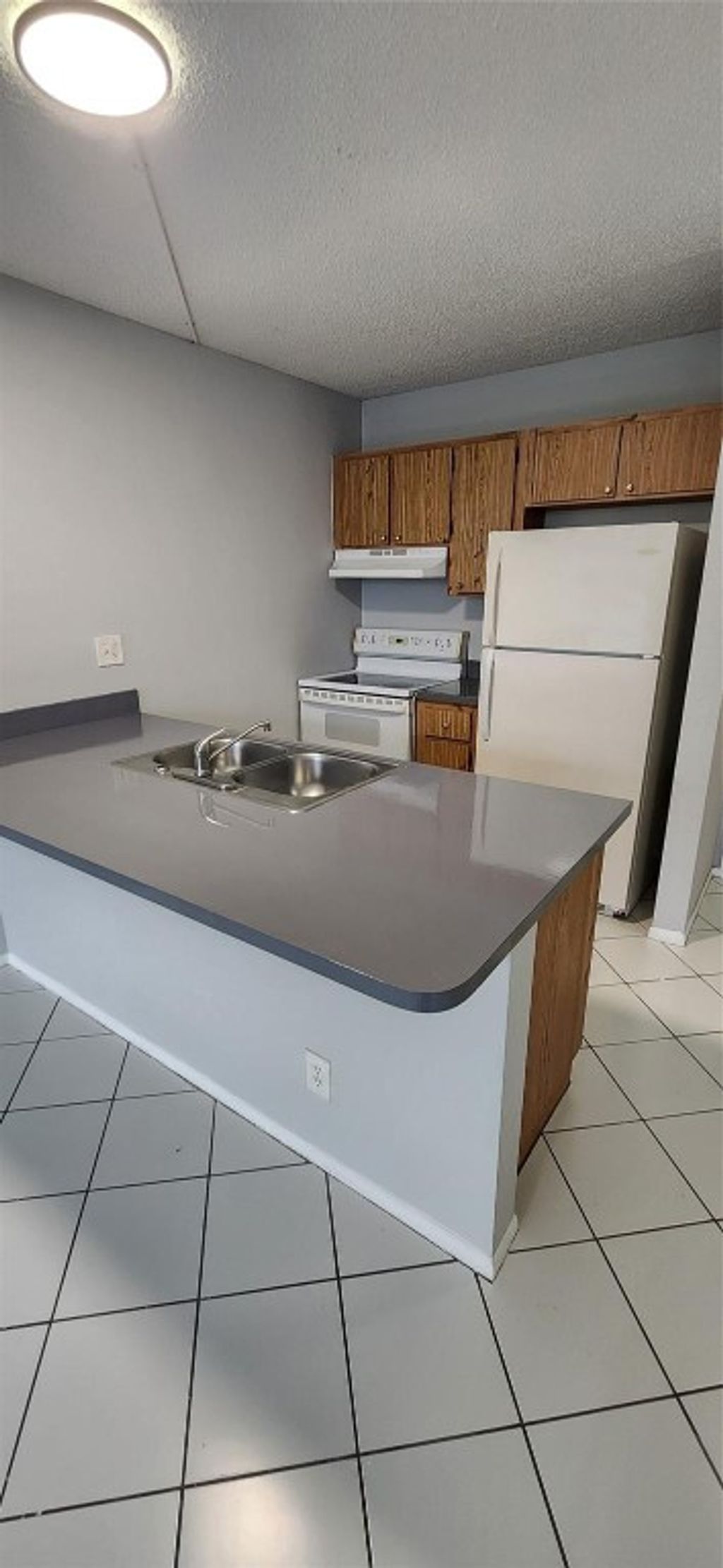 Photo of 2501 Riverside Drive #513-A, Coral Springs, FL 33065 (MLS # F10459077)