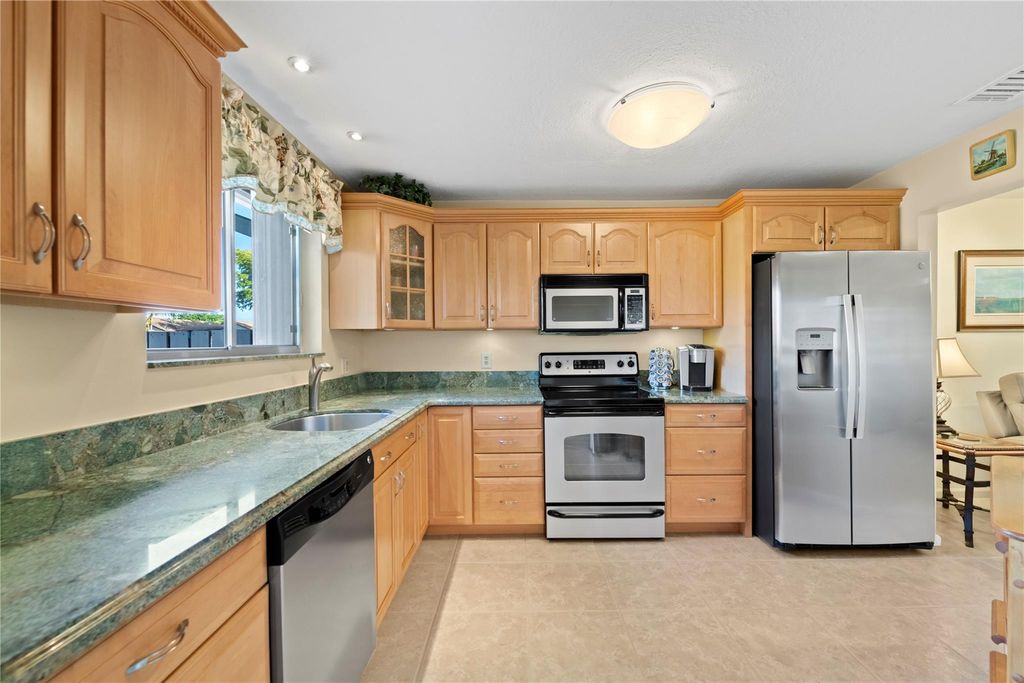 Photo of 2215 Discovery Cir #2215, Deerfield Beach, FL 33442 (MLS # F10541835)