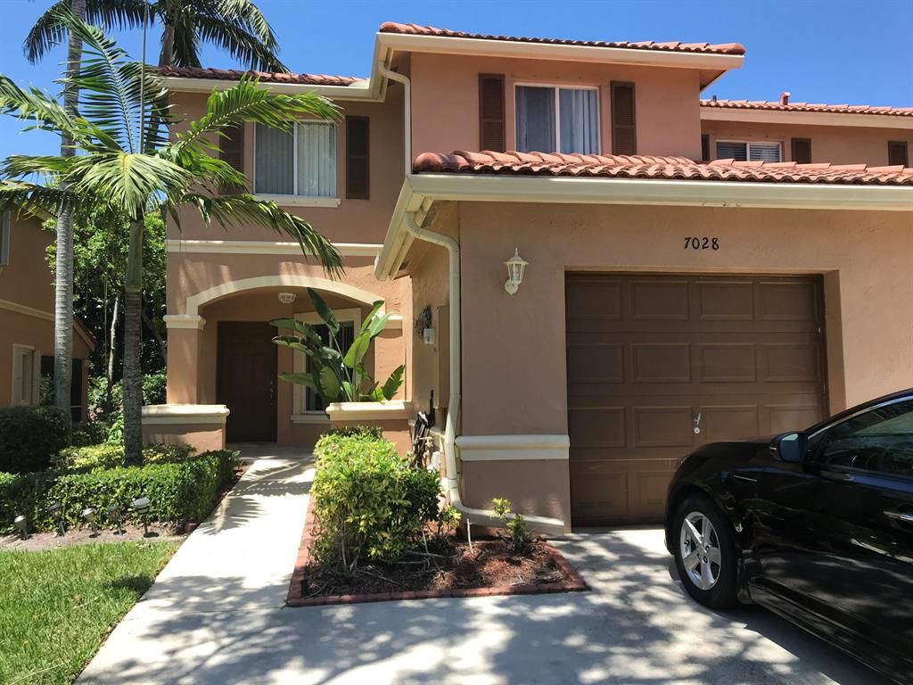 Photo of 7028 SW Hawks Nest Terrace SW, Riviera Beach, FL 33407 (MLS # R10886513)