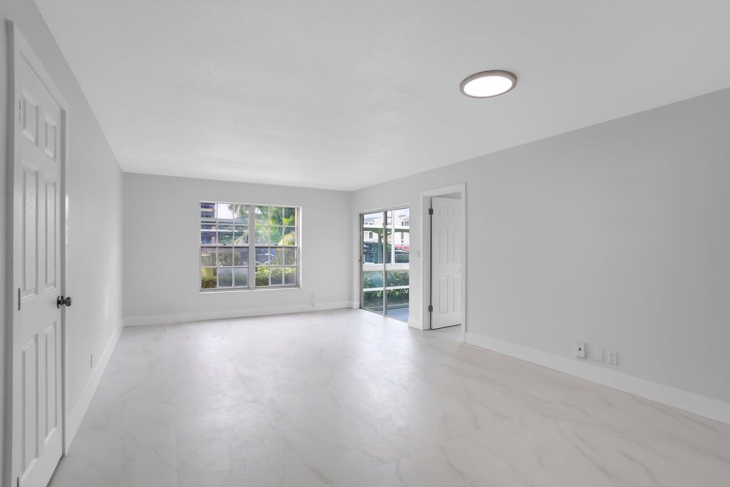 Photo of 5500 Tamberlane Circle #105, Palm Beach Gardens, FL 33418 (MLS # R11052556)