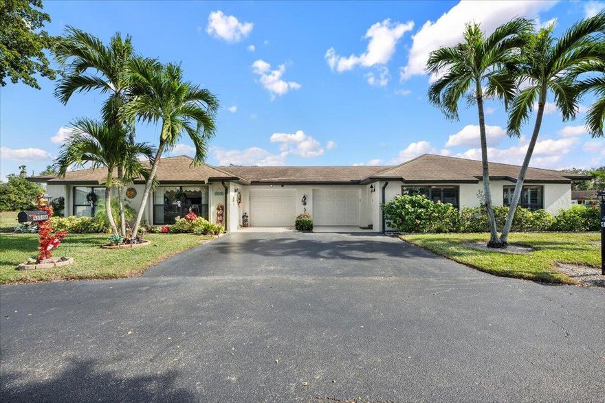 Spacious & well-maintained home located in the Green Villas community of Boynton Beach. The floor plan offers comfortable living and dining areas with a functional layout for everyday living. The kitchen provides ample cabinet & counter space & opens to the main living areas. The enclosed Florida room features triple impact sliders, extending the living space &  offering patio enjoyment year-round. Impact windows are installed in the front living room and primary bedroom, complemented by plantation shutters for light control and privacy, with accordion shutters throughout the remainder of the home. Bathrooms have been updated, including glass shower doors. The primary bedroom includes a walk-in closet and private ensuite bath. Green Villas is well maintained  with resort style ammenities