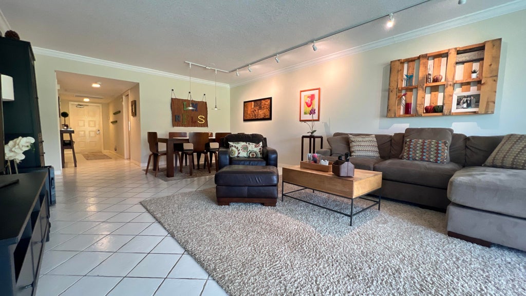 Photo of 4017 N CYPRESS Drive #101, Pompano Beach, FL 33069 (MLS # B26064753)