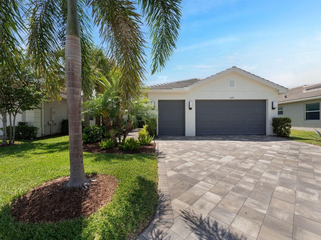 Photo of 11493 SW Half Moon Lake Lane, Port Saint Lucie, FL 34987 (MLS # R10984365)