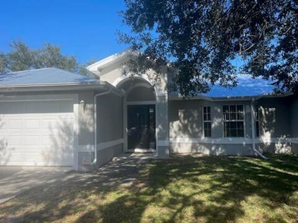 Photo of 271 SW Covington Road, Port Saint Lucie, FL 34953 (MLS # R11039139)