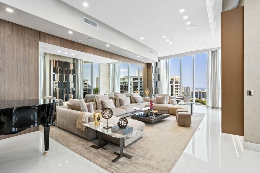 This is ''THE ONE'' @ Bellini. Most desirable residence in the building, half of the top floor. This highly coveted penthouse has 180 degree ocean, bay & city skyline views from FLL to South Beach and beyond. 12-ft floor-to-ceiling impact glass in every room offers dramatic sunrise & sunset vistas--some of the best in South Florida. Private elevator entrance. Over $1.5M in bespoke enhancements by celebrated designers Claudio & Valentina Micu: backlit onyx walls, lacquered channeled doors and trims, custom wood panel walls and cabinetry throughout. A fusion of scale, style & sophistication. Located on exclusive Williams Island with private marina for yachts up to 140 ft, renowned tennis & pickleball, luxury spa, fitness, dining & vibrant social calendar. Truly a ''ONE OF ONE'' property.