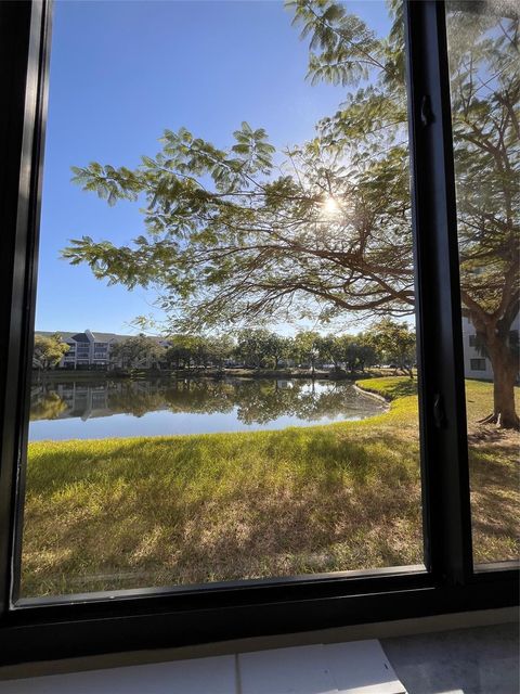 Photo of 8020 Hampton Boulevard #102, North Lauderdale, FL 33068 (MLS # F10542364)