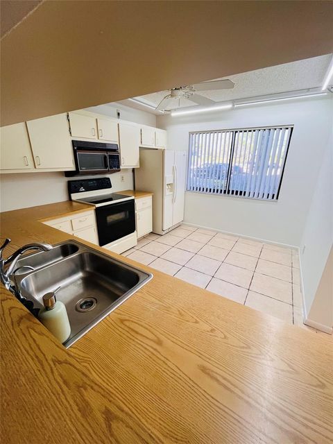 Tiny photo for 8020 Hampton Boulevard #102, North Lauderdale, FL 33068 (MLS # F10542364)