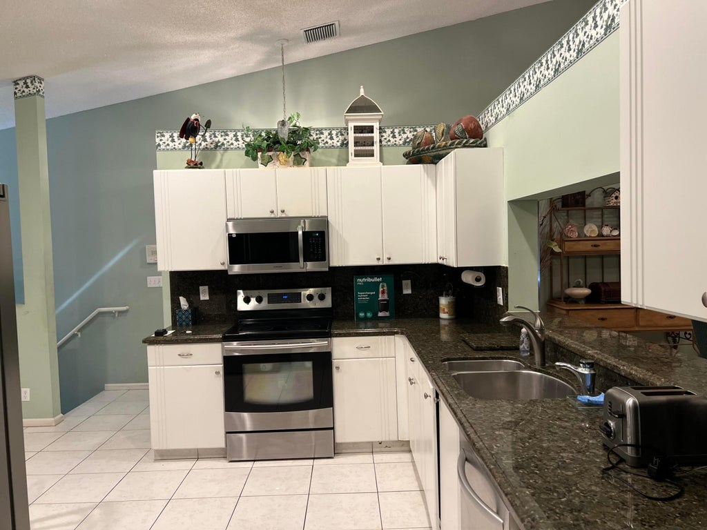 Photo of 9632 SILLS Drive E #204, Boynton Beach, FL 33437 (MLS # B26080004)