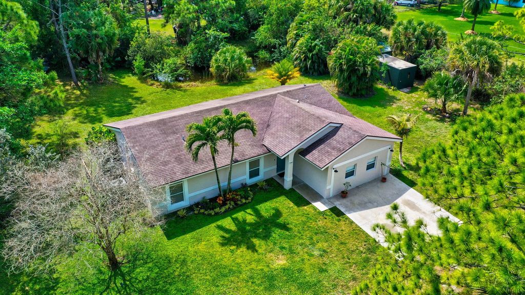 Photo of 15248 76 Road N, Loxahatchee, FL 33470 (MLS # R10967370)