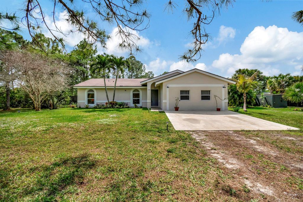 Photo of 15248 76 Road N, Loxahatchee, FL 33470 (MLS # R10967370)