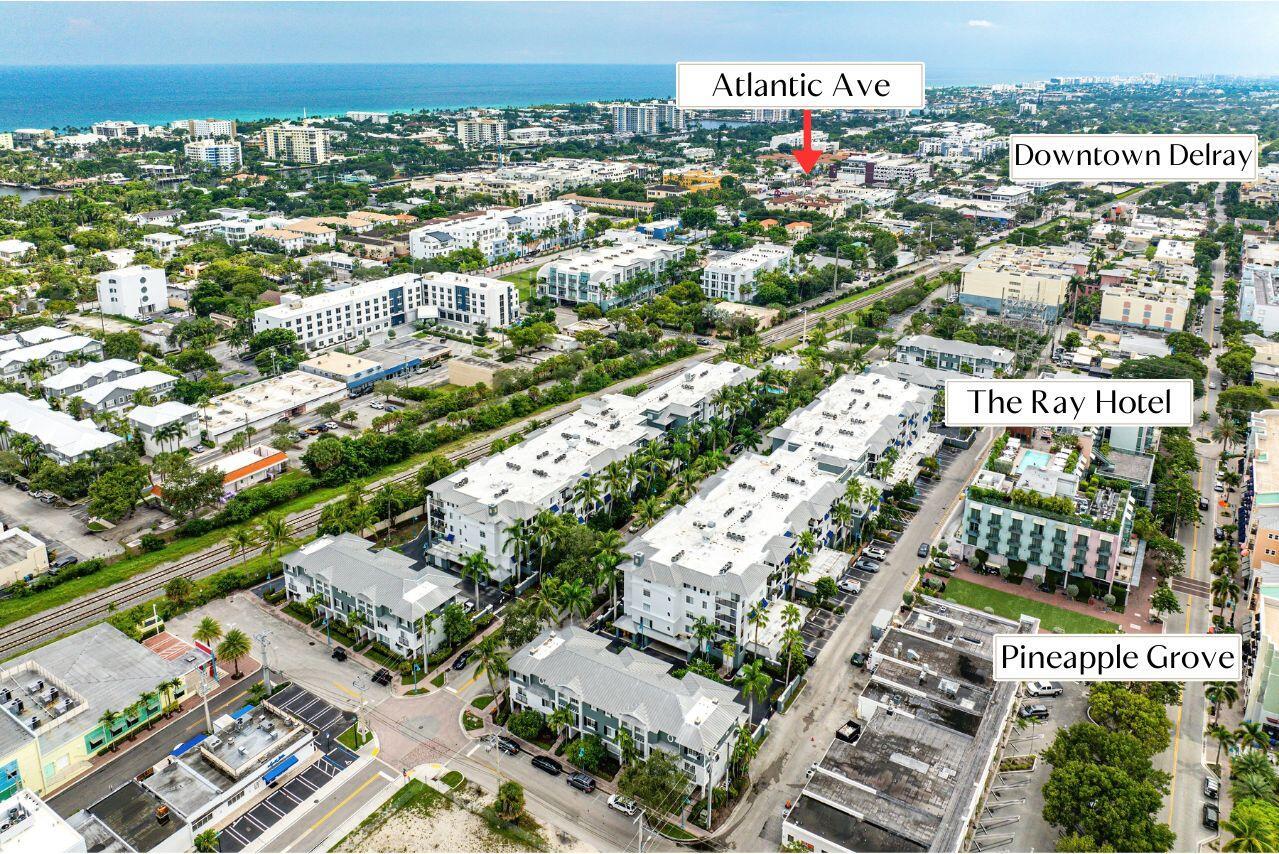 Welcome to Pineapple Grove Village, where downtown Delray Beach living meets modern comfort. This top-floor residence offers a peaceful retreat just steps from the city's vibrant core, with Atlantic Avenue's restaurants, galleries, and boutiques only two blocks away. Inside, the property is finished with sleek tile flooring throughout, and its thoughtfully designed split floorplan provides privacy between the bedrooms while keeping the main living area open and connected. Positioned in the heart of the Pineapple Grove Arts District, residents enjoy walkable access to the neighborhood's creative energy, including public art, music venues, and the eclectic shops and cafes that make this area one of Delray's most desirable addresses.