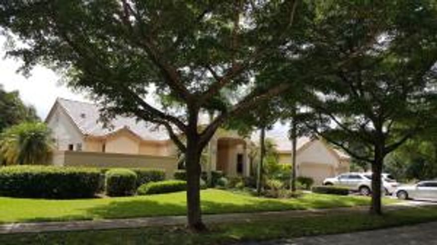 Great opportunity to purchase this pool home in the popular man gated community of Parkside. Updated roof , 3 car garage, screened pool with large covered area to enjoy the outside , split bedroom plan. Plantation shutters on all windows. New carpet in the master bedroom. There is a wet bar with ice maker. A very large family room off the kitchen. This home has central vac and alarm system. The neighborhood has a clubhouse , pool and tennis courts for your use.