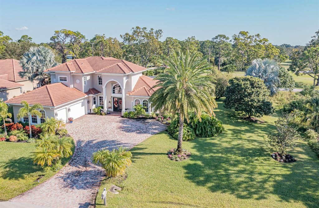 Photo of 1063 SW Squire Johns Lane, Palm City, FL 34990 (MLS # R10851201)