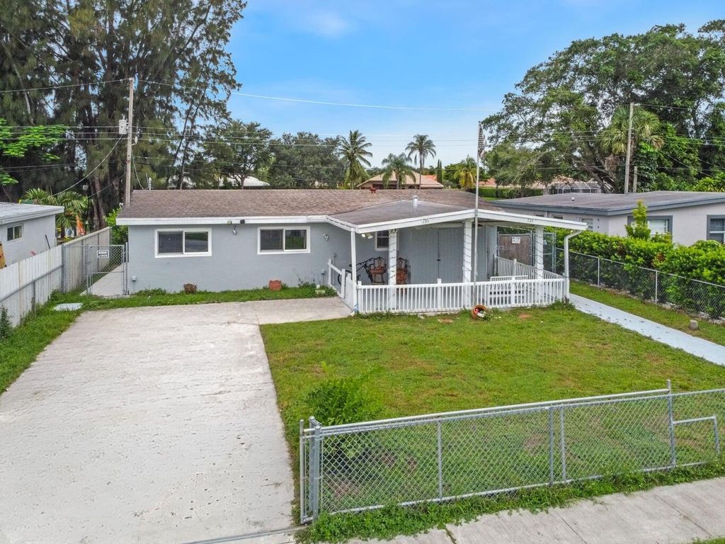 Photo of 735 Hibiscus Drive, Royal Palm Beach, FL 33411 (MLS # R11144954)