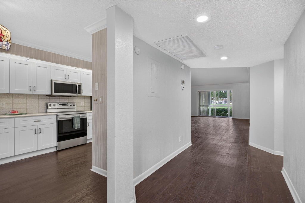 Photo of 1604 Abaco Drive #D1, Coconut Creek, FL 33066 (MLS # B26065020)
