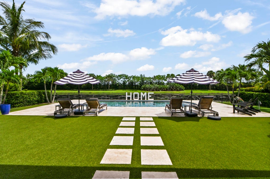 Photo of 9307 Grand Prix Lane, Boynton Beach, FL 33472 (MLS # B26050568)