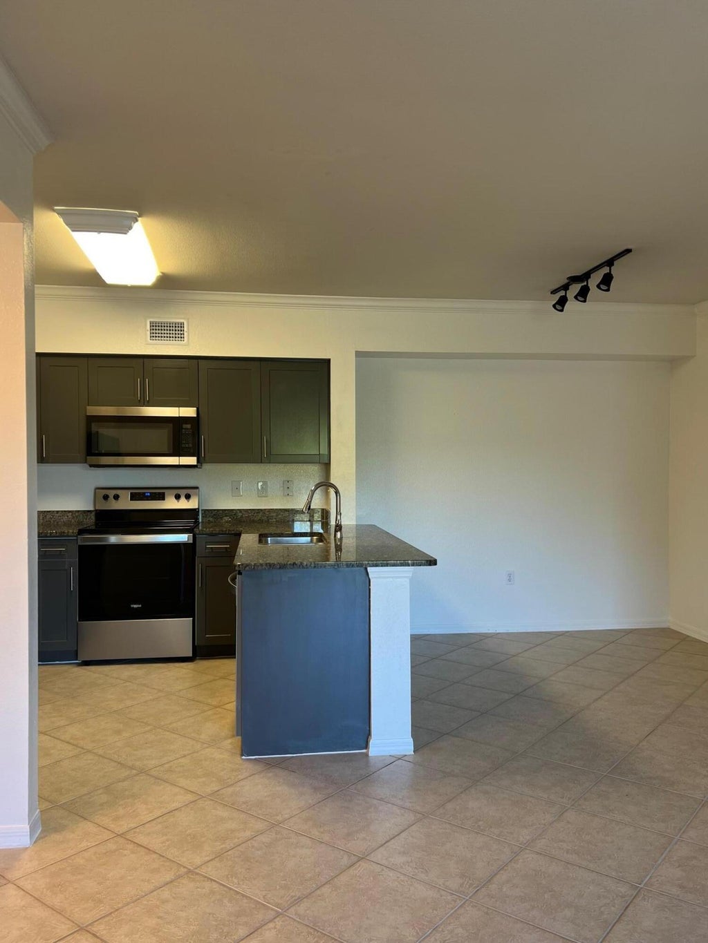 Photo of 6434 Emerald Dunes 302 Drive #302, West Palm Beach, FL 33411 (MLS # R11093412)