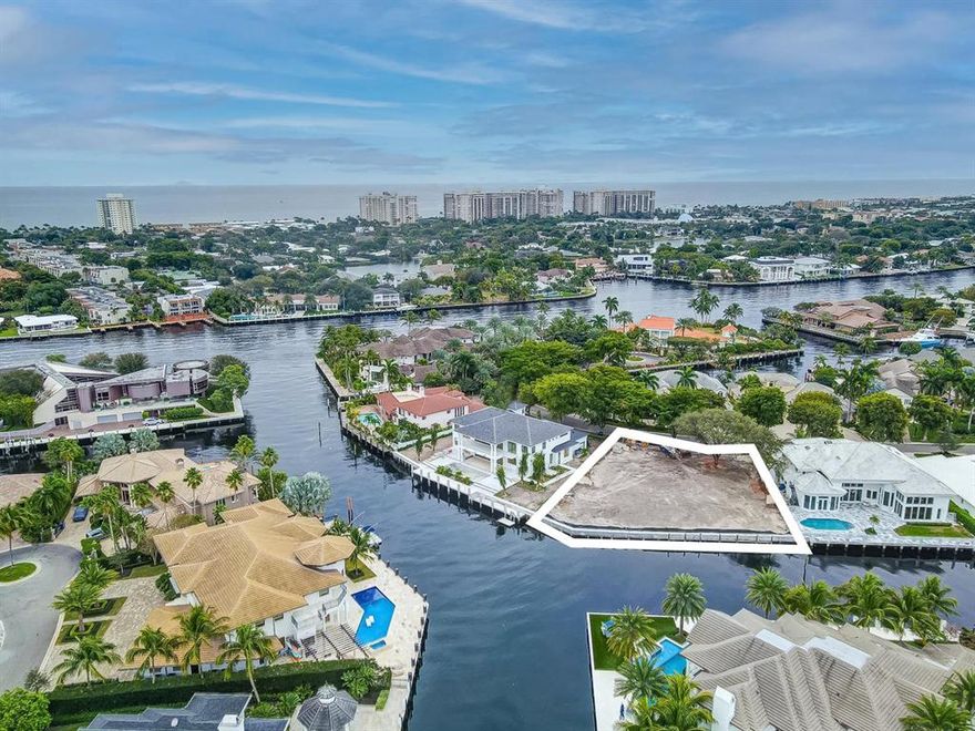 Gated Community of the exclusive Bay Colony. Build on this spectacular lot with 151 ft of direct ocean access with wide views, no fixed bridges and dockage. Located just one mile from Pine Crest School.