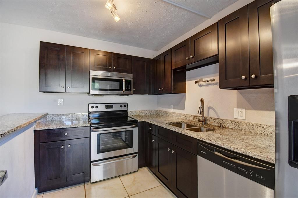 Photo of 718 7th Court, Palm Beach Gardens, FL 33410 (MLS # R10700193)