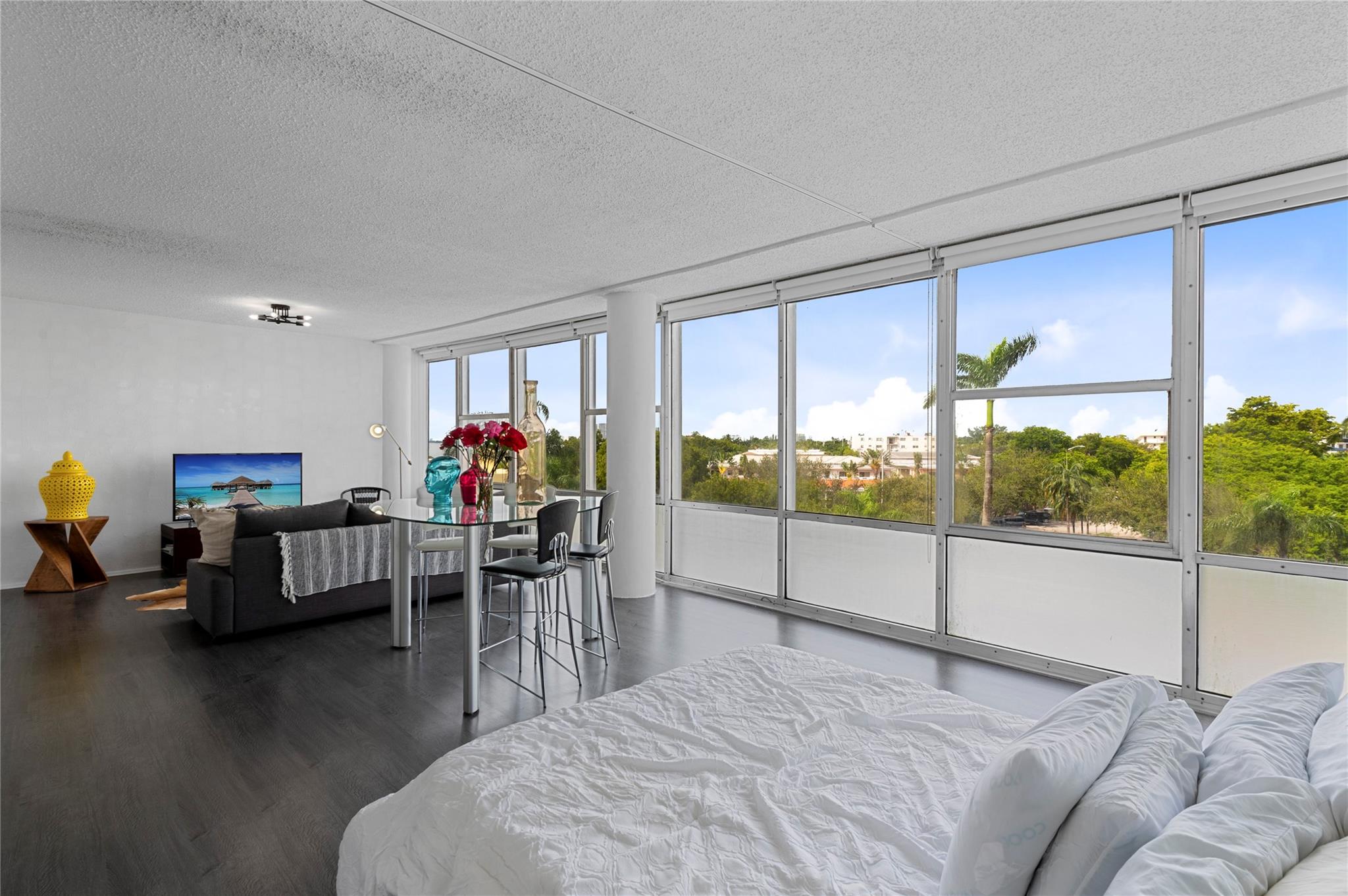 Turnkey, furnished studio in the iconic King Cole building in desirable Normandy Shores! Spacious and filled with natural light, this well-maintained unit features tile floors and generous closet space. Full-service, bayfront building offers 24/7 security, Olympic-size heated pool, marina with dockage up to 83 ft (no fixed bridges), kayak storage, fitness center, BBQ area, playroom, and valet. HOA includes electricity, water, internet, and cable! Prime location—minutes to the beach, restaurants, boardwalk, shops, farmers market, and houses of worship. Tenant in place month-to-month—perfect for investors or future end users. Pet-friendly, easy to show, and priced to sell fast