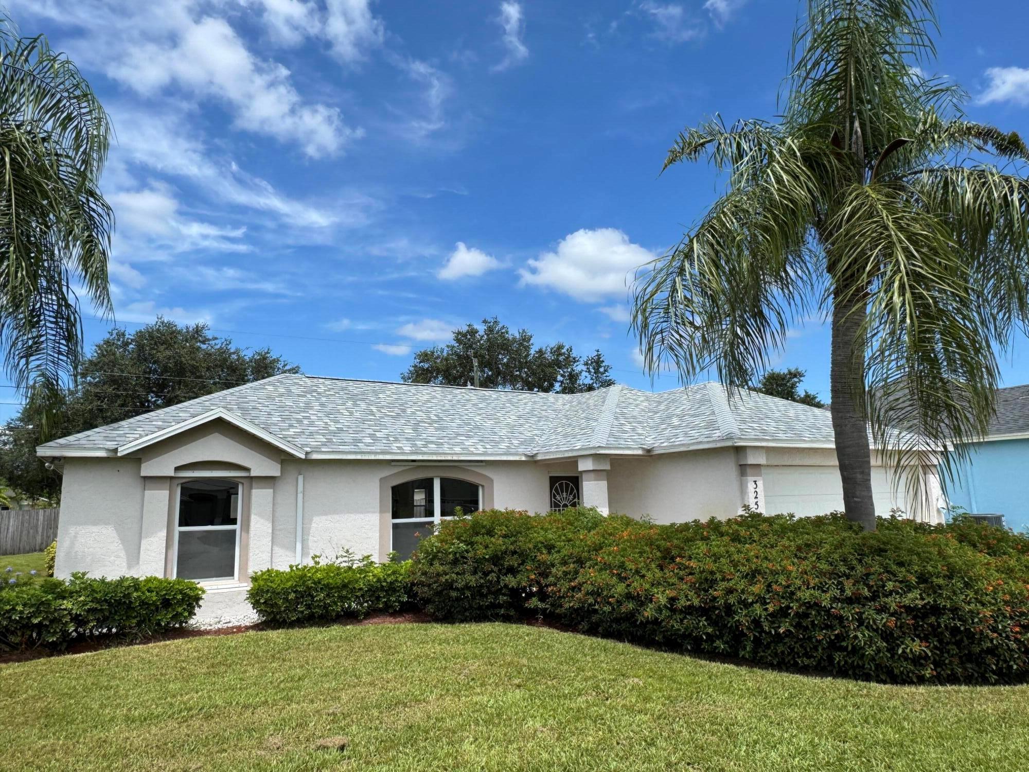 New roof on this Amazing South Bend Property, within walking distance the Jessica Clinton Park. South Bend is one of Port St Lucie's Most Desirable areas Offering parks, Boat ramp and Easy access to Palm City and Highways. Super cute home with a spacious yard with mature landscape and New Roof. Inside you have a Spacious floor plan offering a separate living, dining and family room along with a Split bedroom layout. The home has had New LVP flooring installed. The Deluxe master offers Dual Sinks and a separate tub and shower. Out back you have a large Rear porch ready to entertain! Come see everything this Home and the Southbend area has to offer.